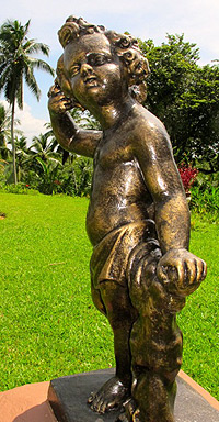 A child's statue in the garden