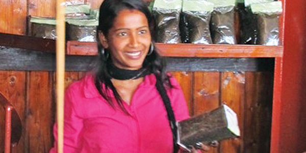 Tea sold at source with a smile. Photo B Kumarasiri